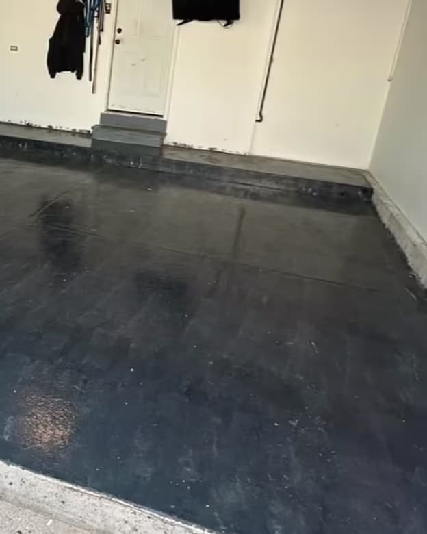 The failing dark coating installed by a previous contractor, before Absolute was called in