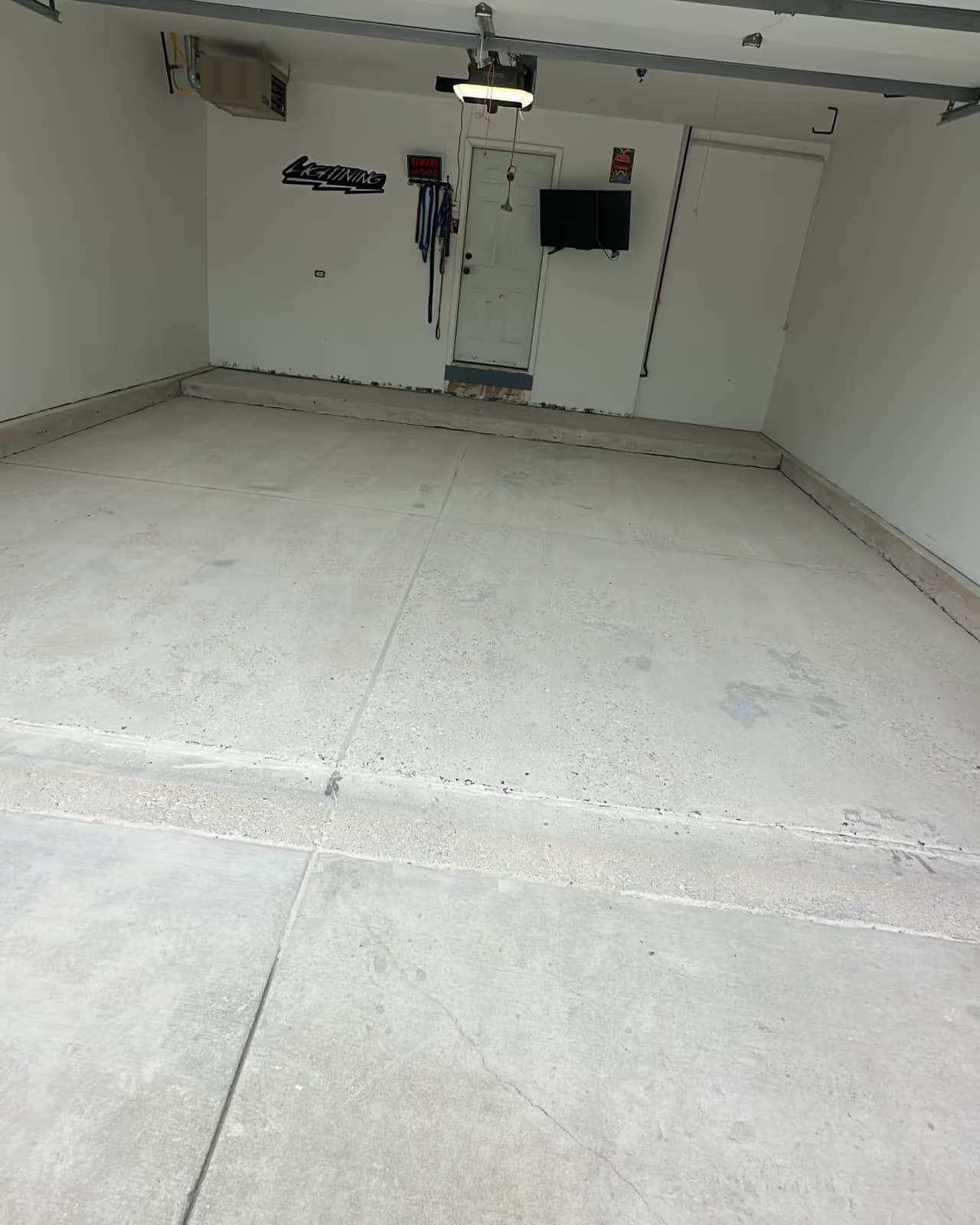 The reset — Absolute ground the failed coating off, back to clean bare concrete